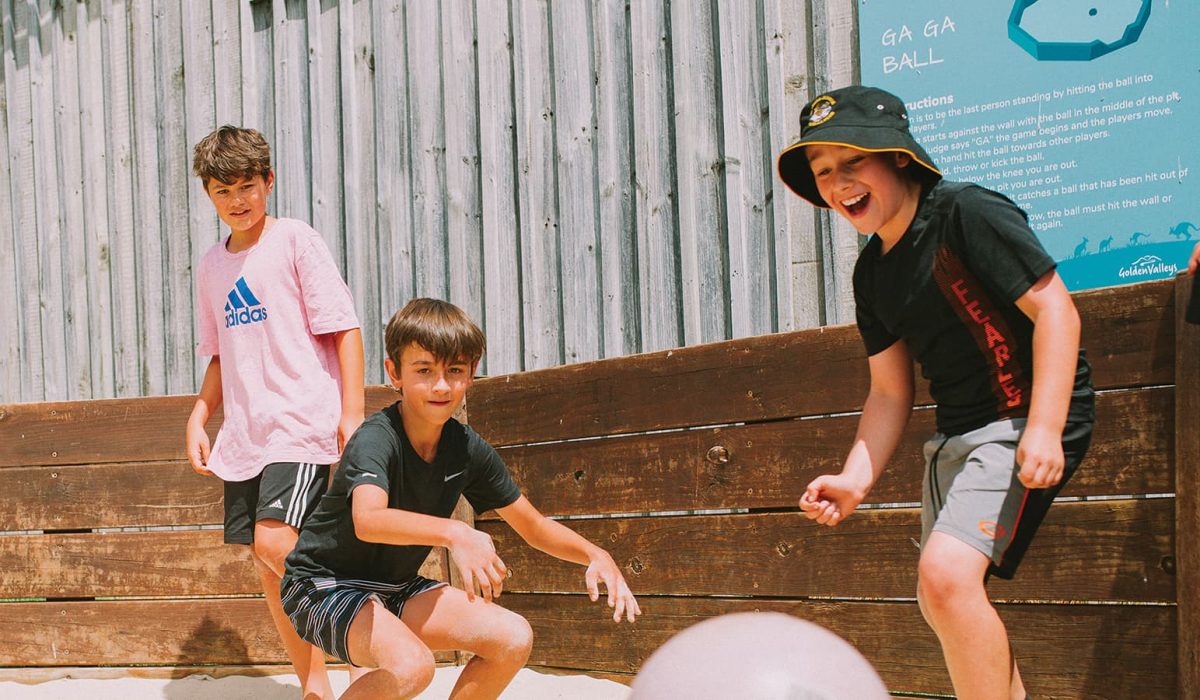 Kids playing gaga ball at holiday camp in Melbourne.