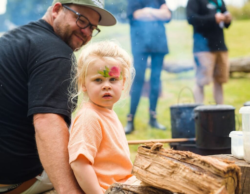 Image of Father with Daughter doing family activities and family accommodation at adventure camp.